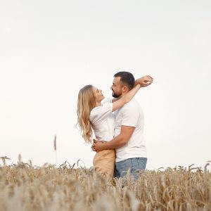 Beautiful Couple Spend Time In A Autumn Field